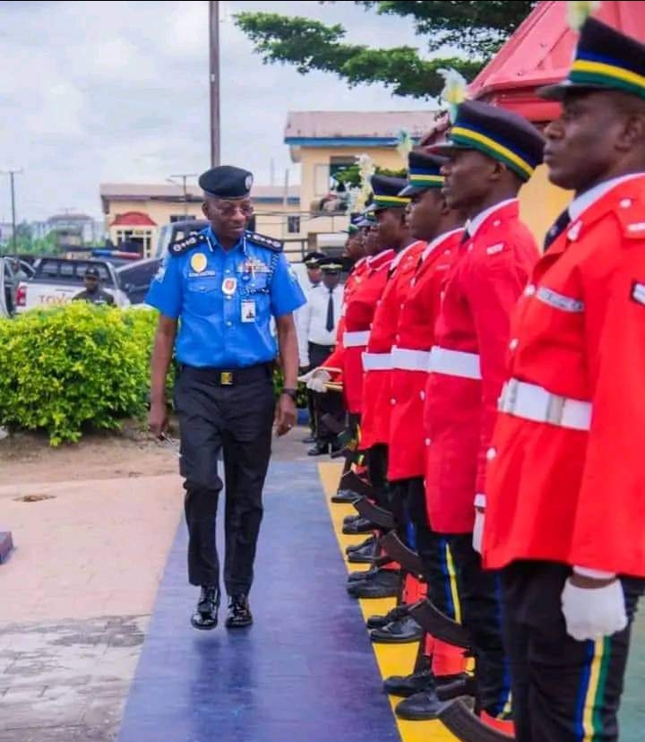 The Commissioner of Police (CP), Kogi State Command, Mr Bethrand Onuoha inspecting guard of homour in Command headquarters Lokoja