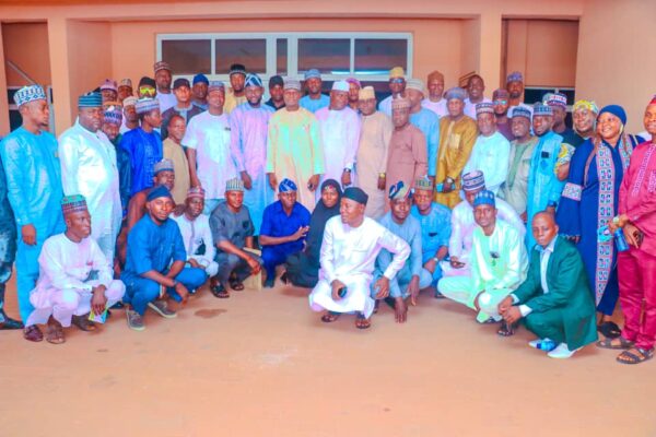 Nasarawa State House of Assembly Speaker, Rt. Hon. Danladi Jatau in a group photograph with 13 LG Legislators and their principal of