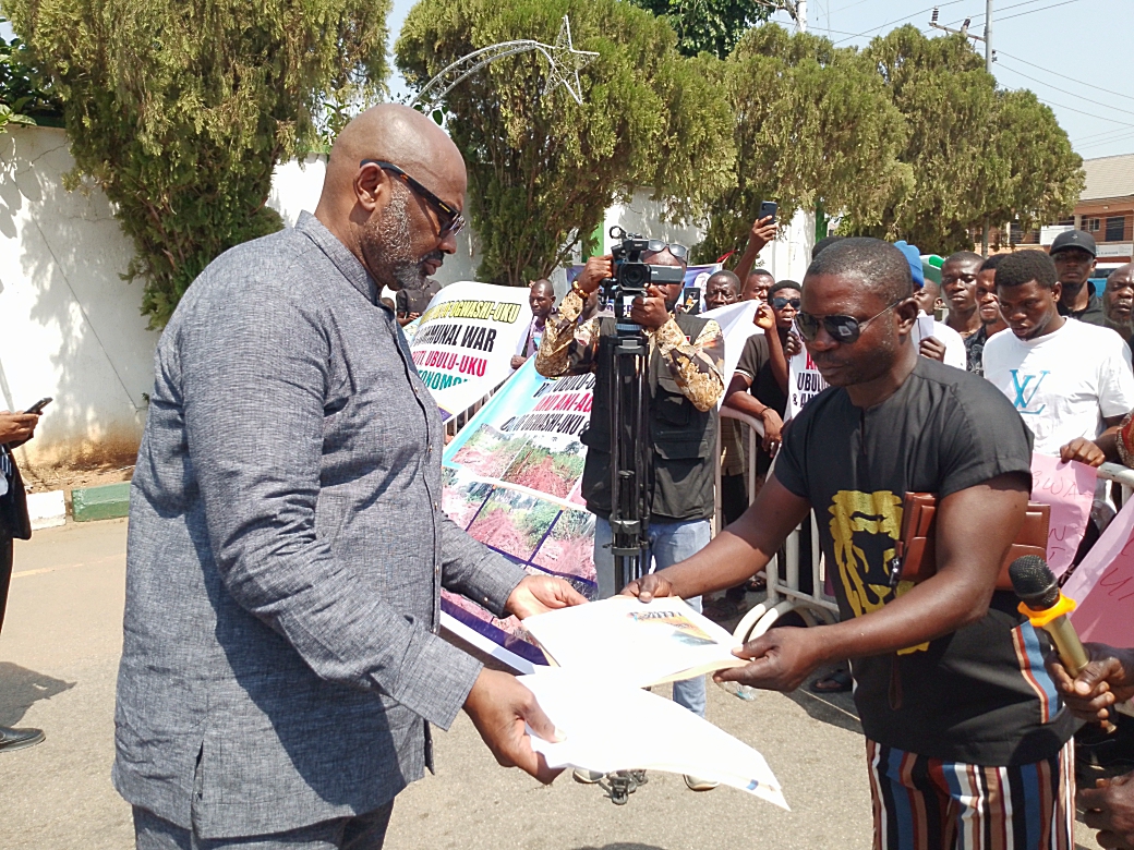 Secretary to the State Government, SSG, Dr Kingsley Emu receiving letter of protesters