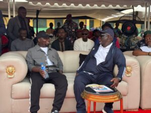 Delta State Governor,  Rt Hon Sheriff Oborevwori (right), and his son and host of the Osubi Community Unity Cup, Sheriff Oborevwori Junior during the grand finale of the competition at Osubi Secondary School, Osubi in Okpe LGA on Sunday. Pix Enarusai Bripin